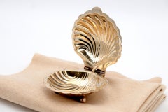 Silver butter dish in the shape of a hinged shell
