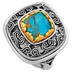 Bague en argent à dôme byzantin avec doublet de turquoises en cuivre