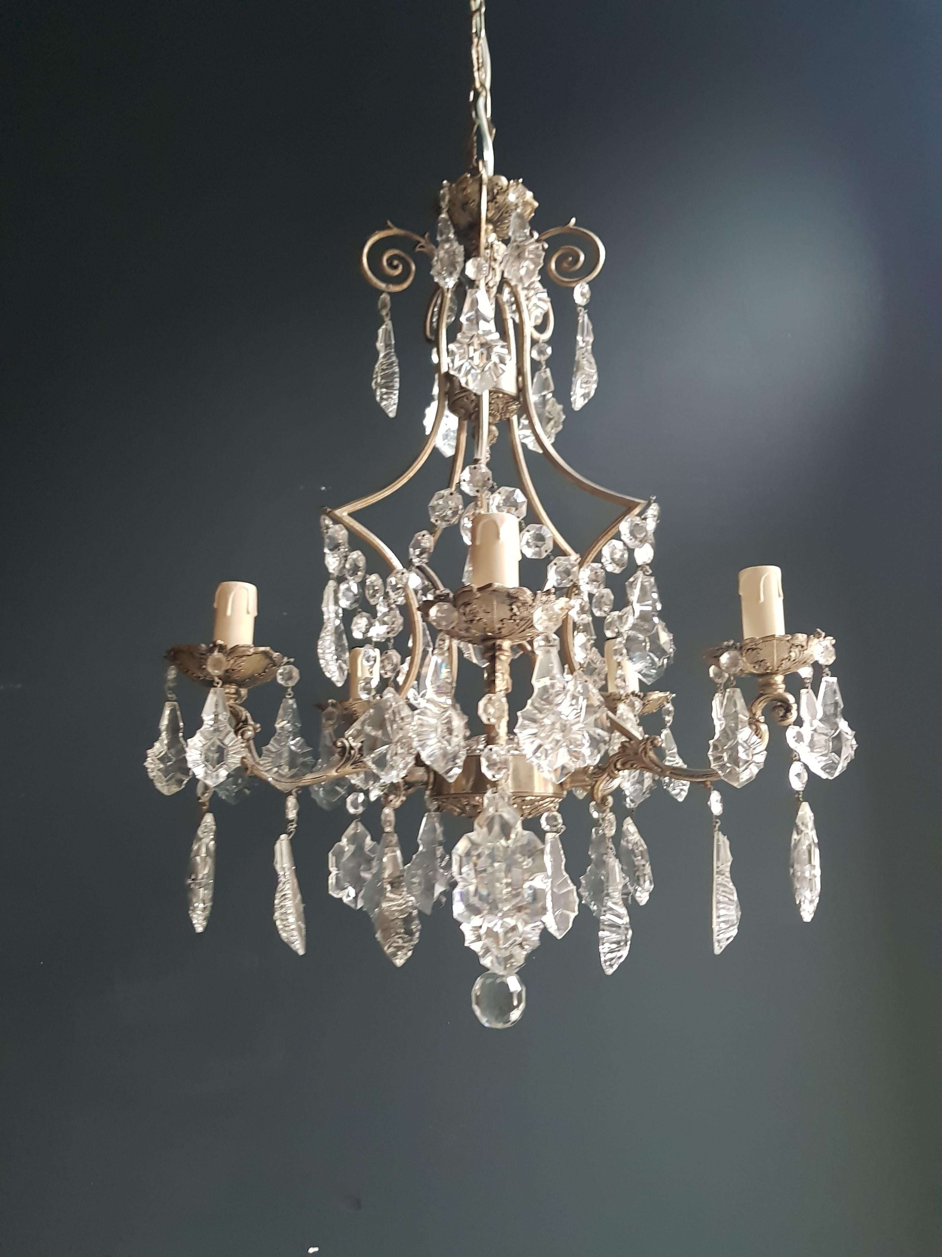 Silvered cage putt crystal chandelier antique ceiling lamp lustre

Measures: Total height 120 cm, height without chain 66 cm, diameter 47 cm. Weight (approximately): 5kg.

Number of lights: Five-light bulb sockets:  E14 material: Brass, glass,
