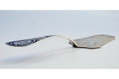 Silver cake serving spatula