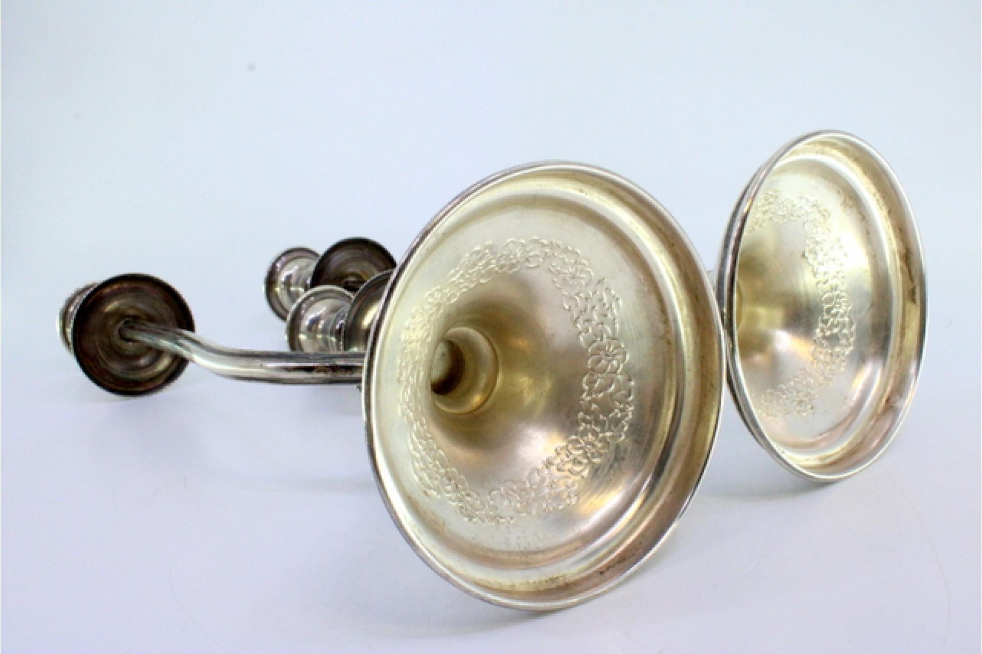 European Silver candelabra w/ two beaded lights & floral reliefs on the circular bases For Sale