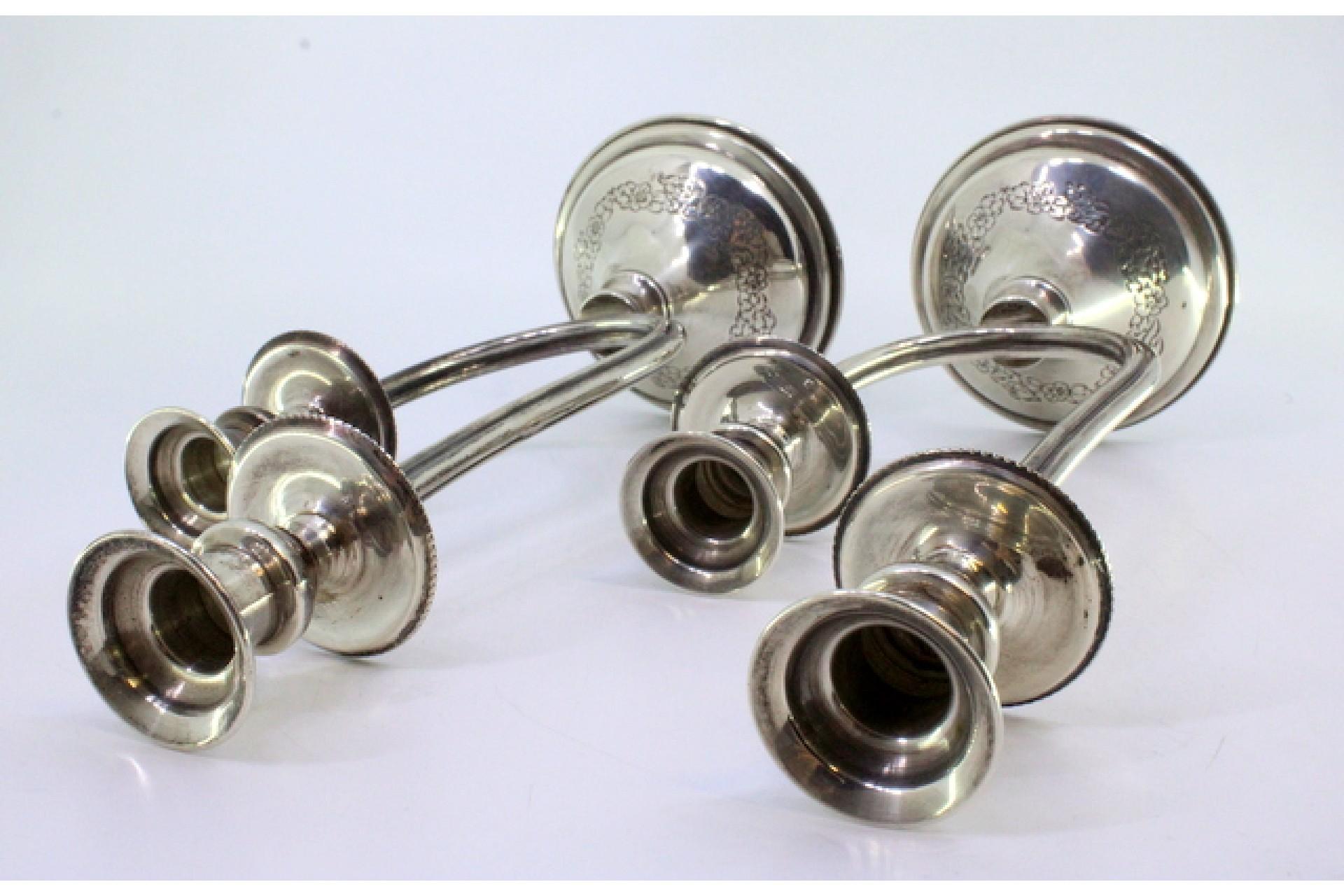 Silver candelabra w/ two beaded lights & floral reliefs on the circular bases In Good Condition For Sale In Porto, PT