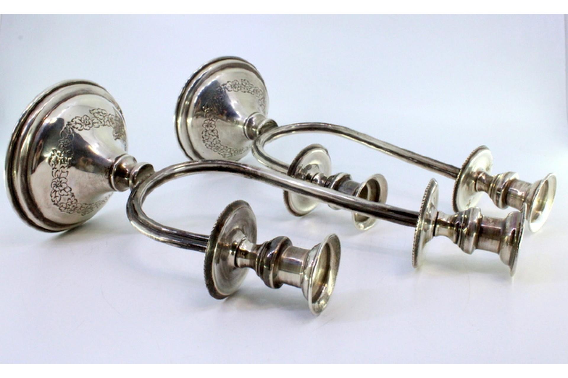 20th Century Silver candelabra w/ two beaded lights & floral reliefs on the circular bases For Sale