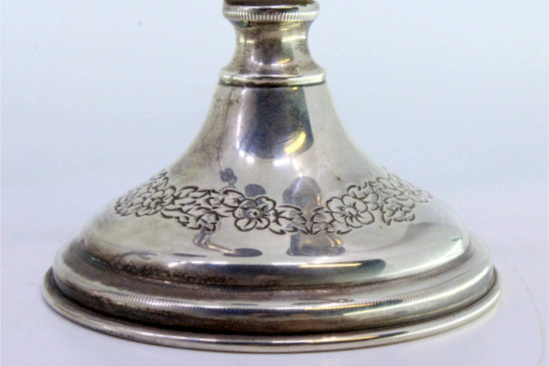 Silver candelabra w/ two beaded lights & floral reliefs on the circular bases For Sale 1