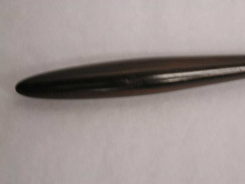 Silver candle snuffer with wooden handle, dated 1999, Millennium Hallmark, London
Nicely formed so that you can snuff out a candle fairly easily.
Measures: 15 centimetres long, 5.5 centimetres high.
  