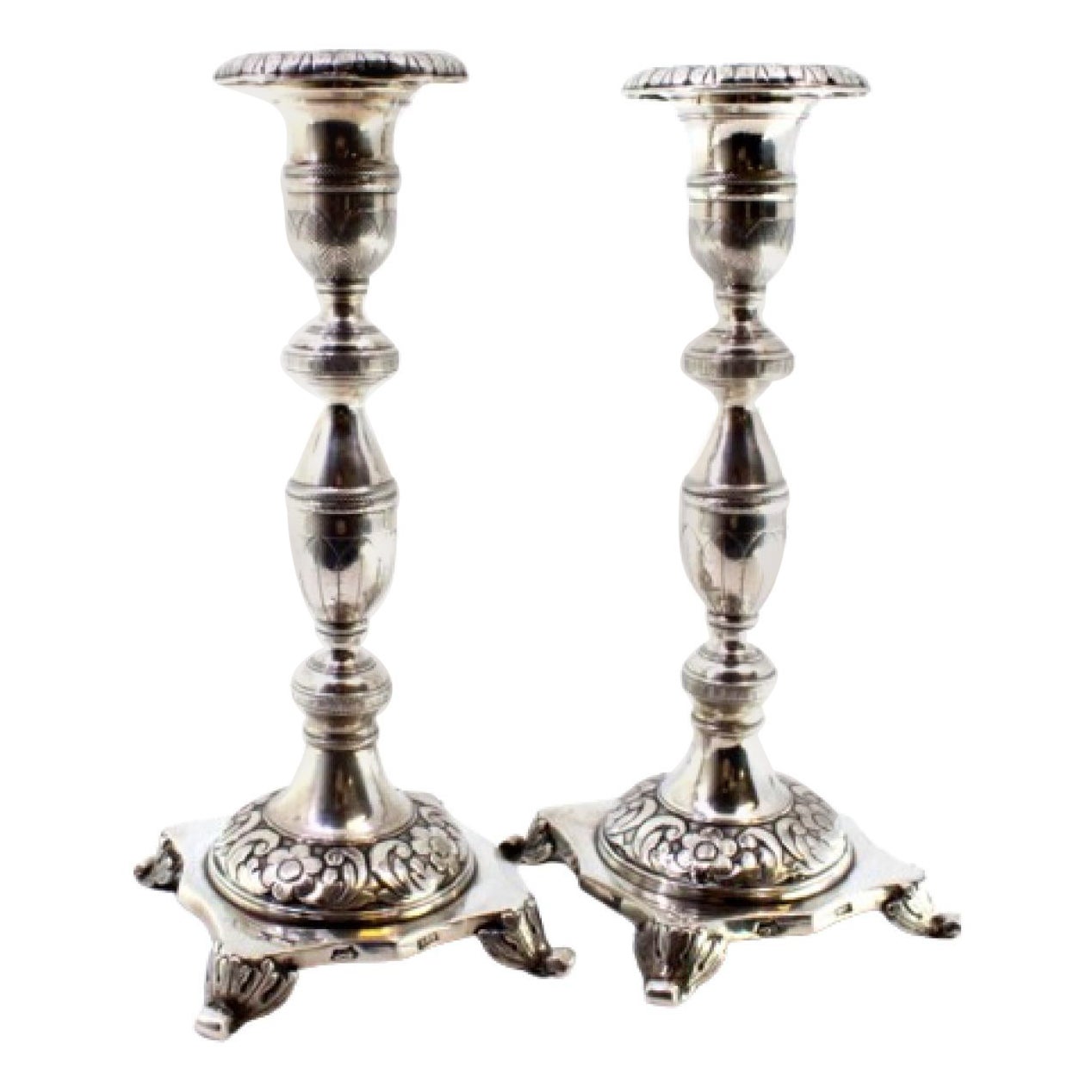 Silver candlestick set with engraved shafts 
acanthus-footed base