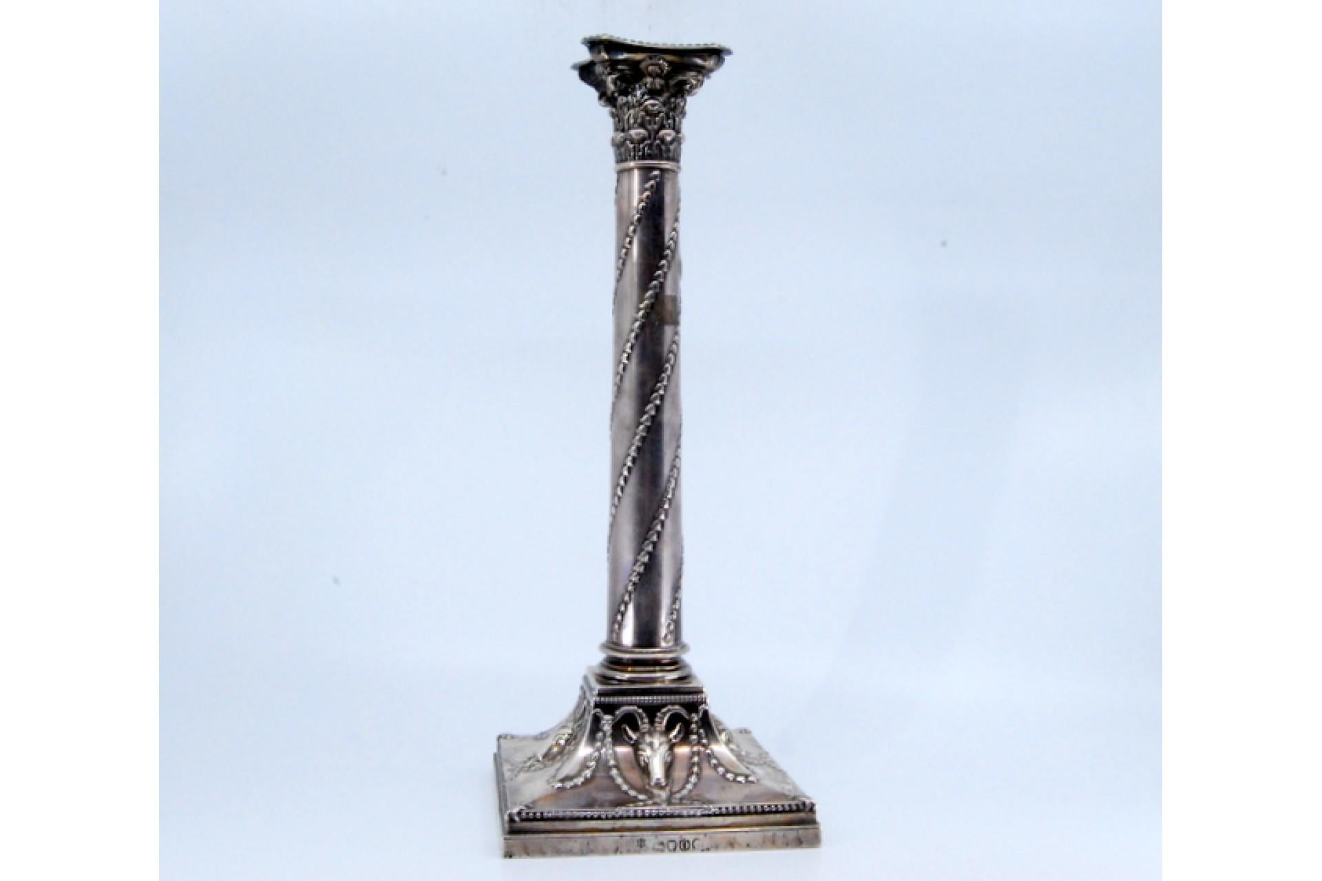 European Silver candlestick with rope-wound shaft and ram heads on square base For Sale