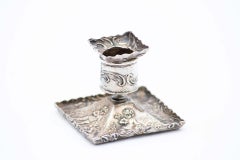 Silver candlestick with square base