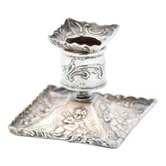 Silver candlestick with square base