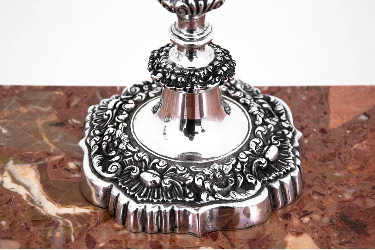 900 silver candlesticks.
Set of 2
Beautifuly ornamented. 
Dimensions: height 30.5 cm / width 14.5 cm / depth 14.5 cm.