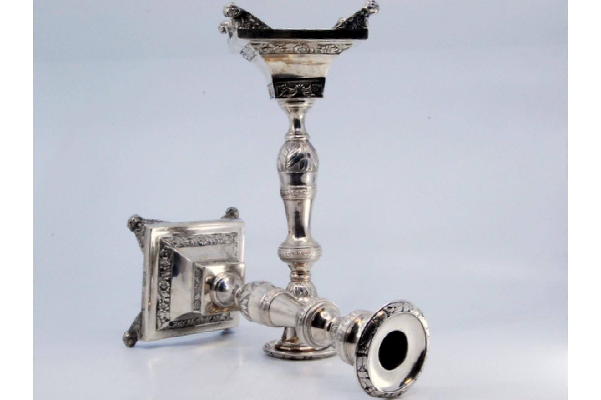 European Silver candlesticks with floral engravings on square bases with round feet For Sale