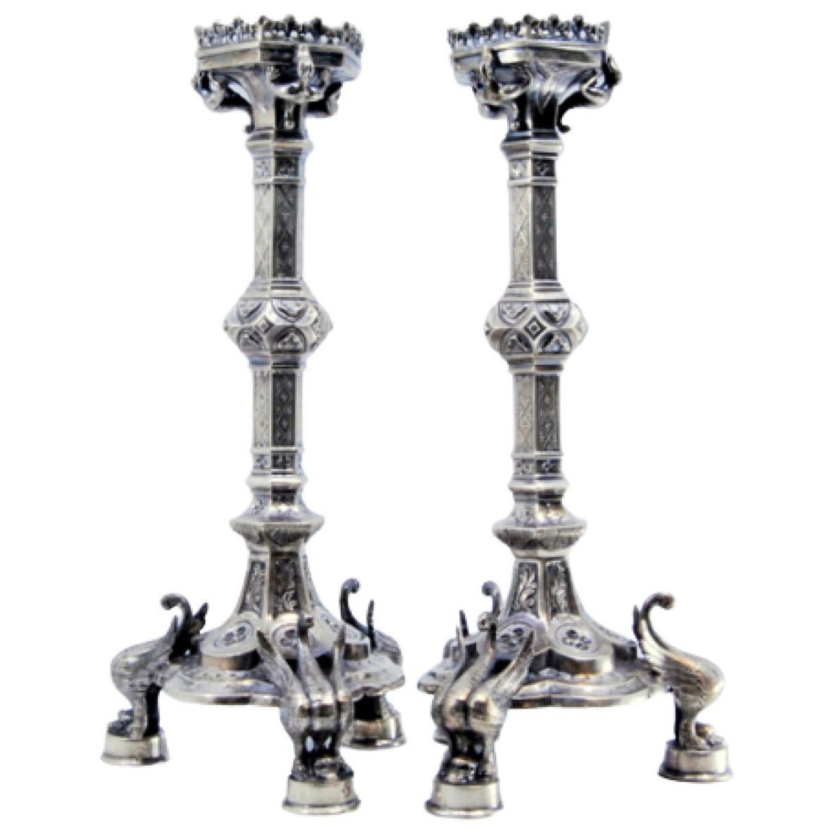 Silver candlesticks with grated stems on hexagonal bases over swans For Sale