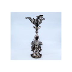 Silver candlesticks with turned stems & acanthus-cut bases