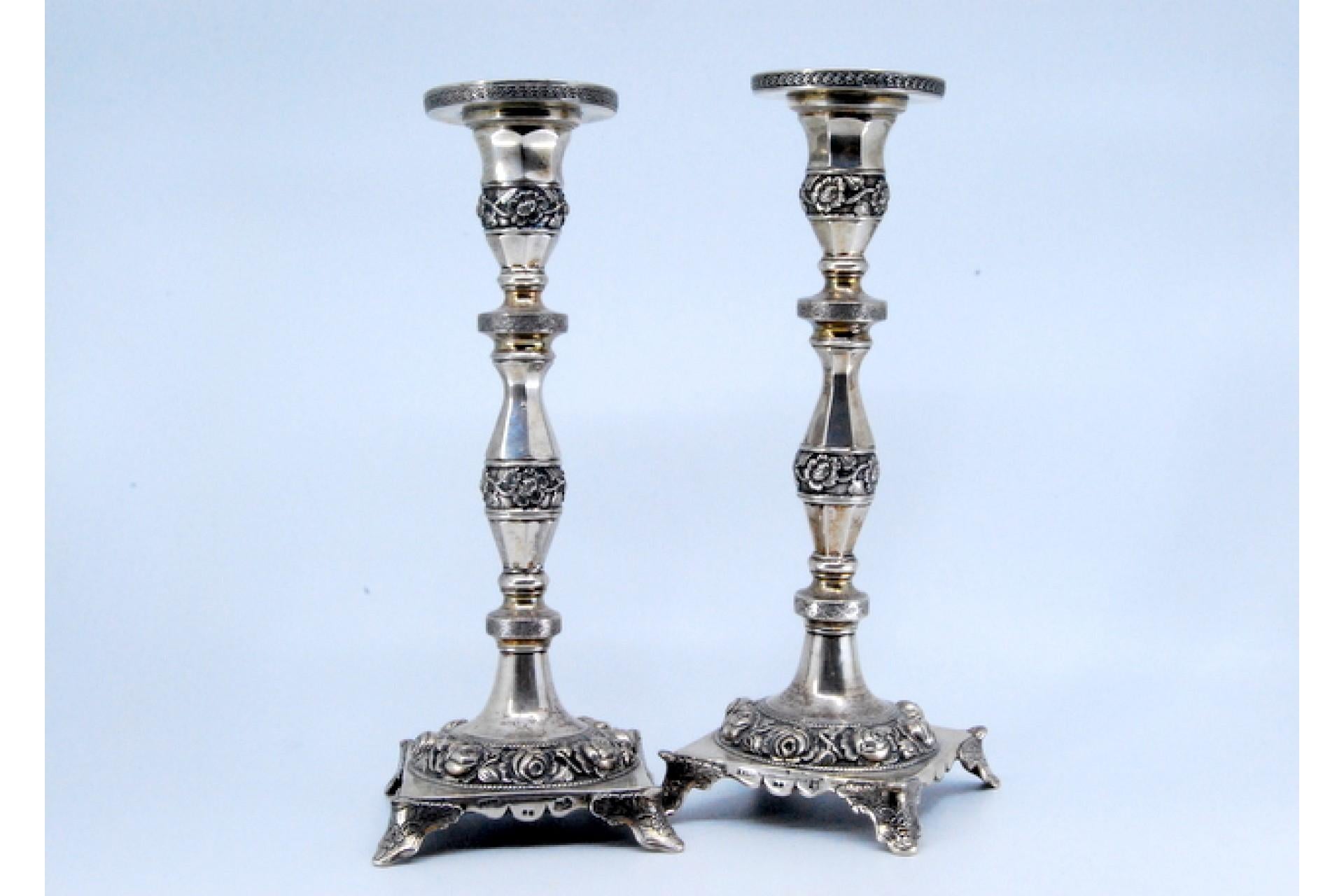 Silver candlesticks with turned stems and floral reliefs on four-foot bases For Sale 6