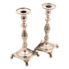 Silver candlesticks with turned stems