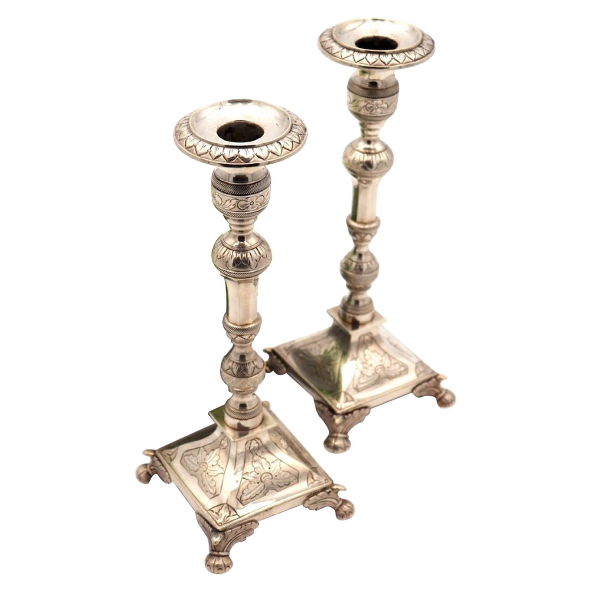 Silver candlesticks with turned stems