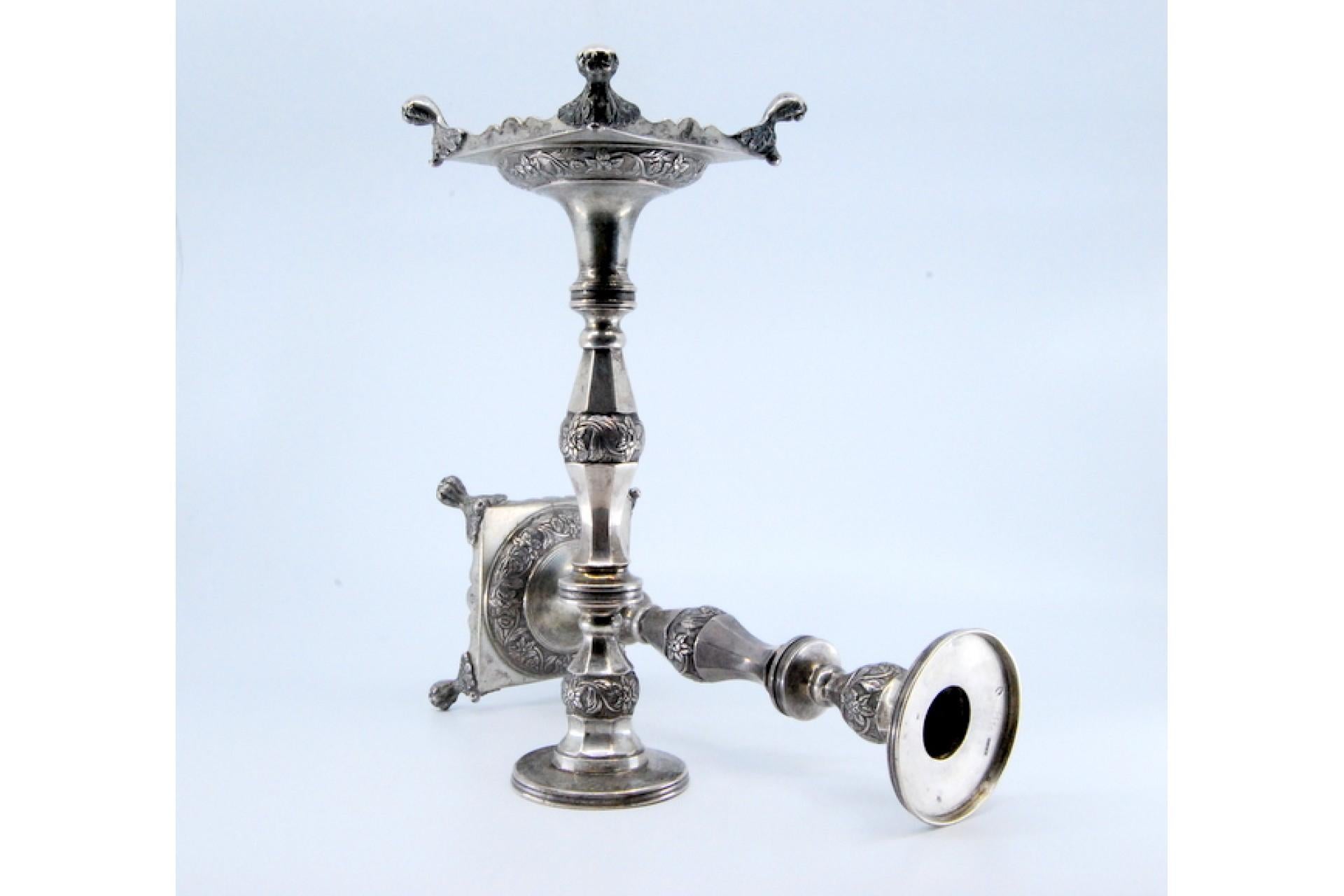 European Silver candlesticks with turned stems on square bases with claw feet For Sale
