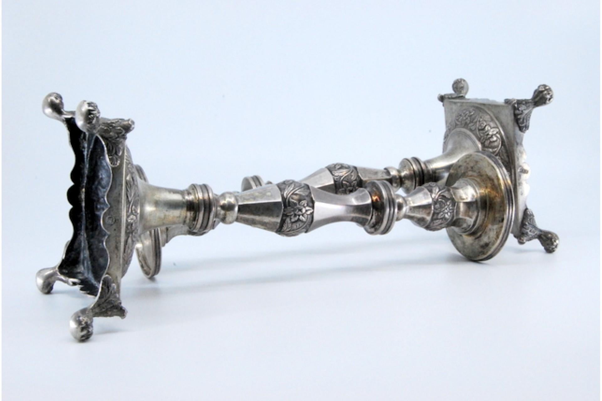 18th Century Silver candlesticks with turned stems on square bases with claw feet For Sale