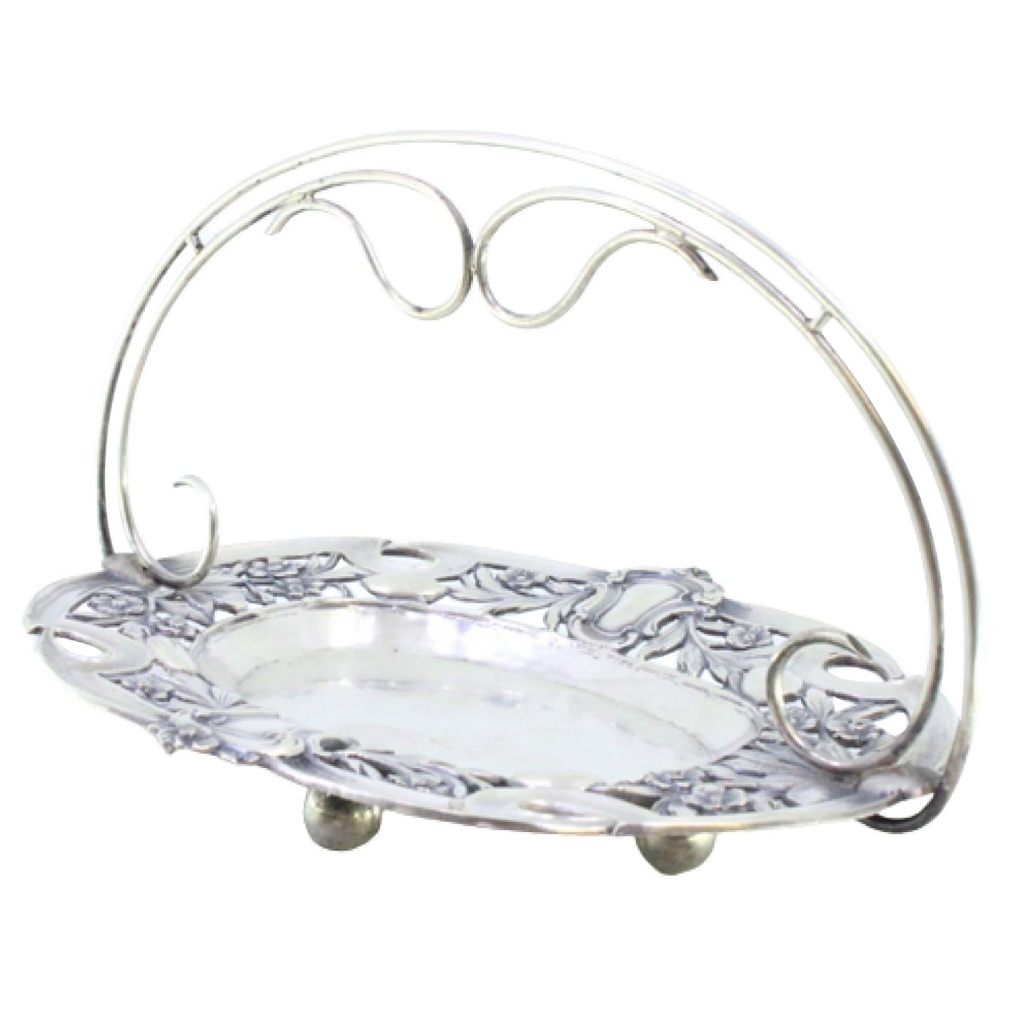 Silver candy box w/ cut-out florals, monogram
4 ball feet