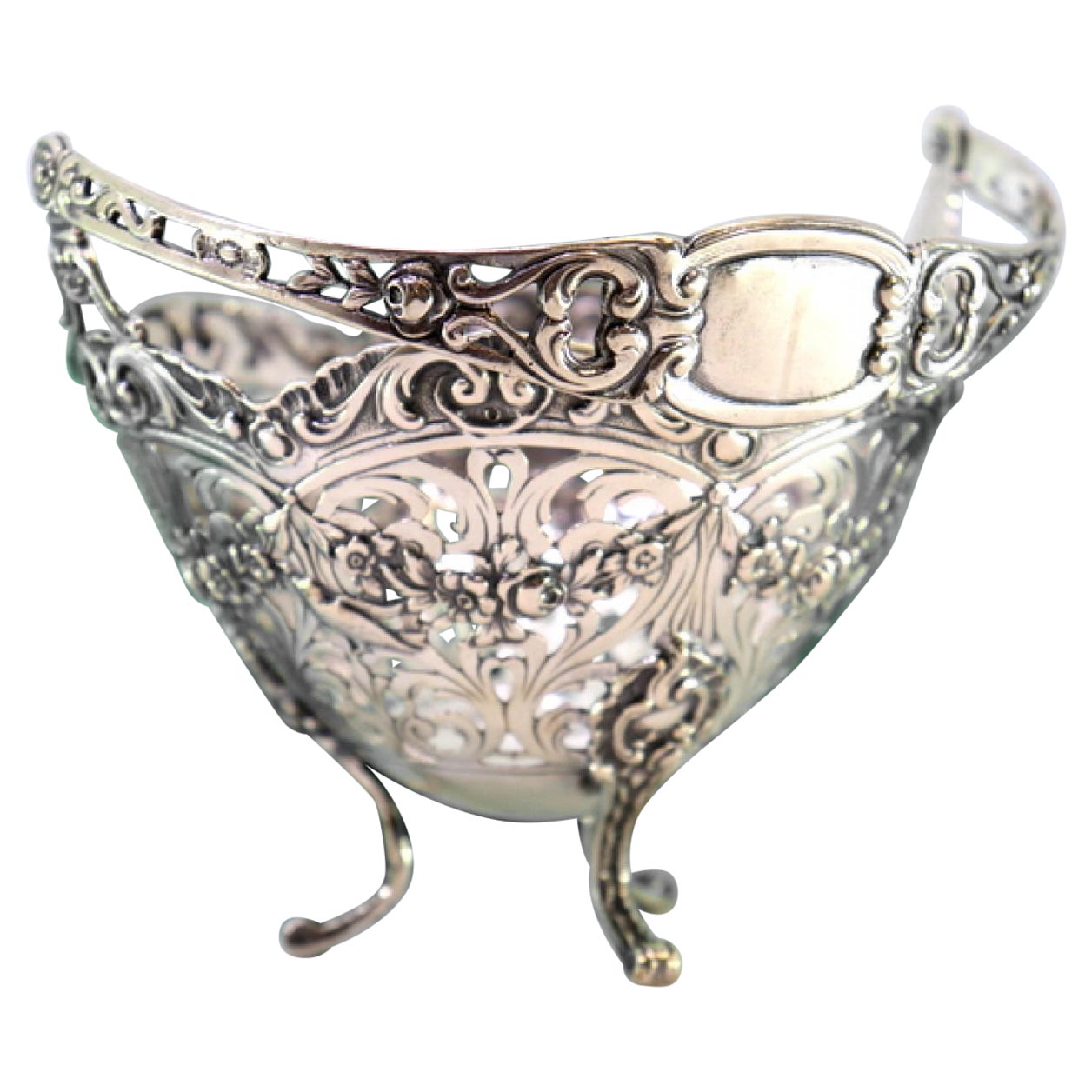 Silver candy box w/ cut-out florals, monogram handle 
tall feet