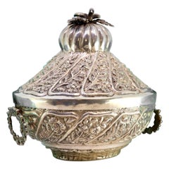 Silver candy box w/ floral reliefs 
dove-shaped hinged lid