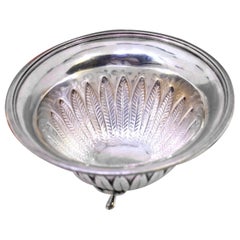 Silver candy box with acanthus-leaf embossing on three tall feet