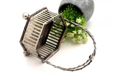 Silver candy box with cutouts and openings