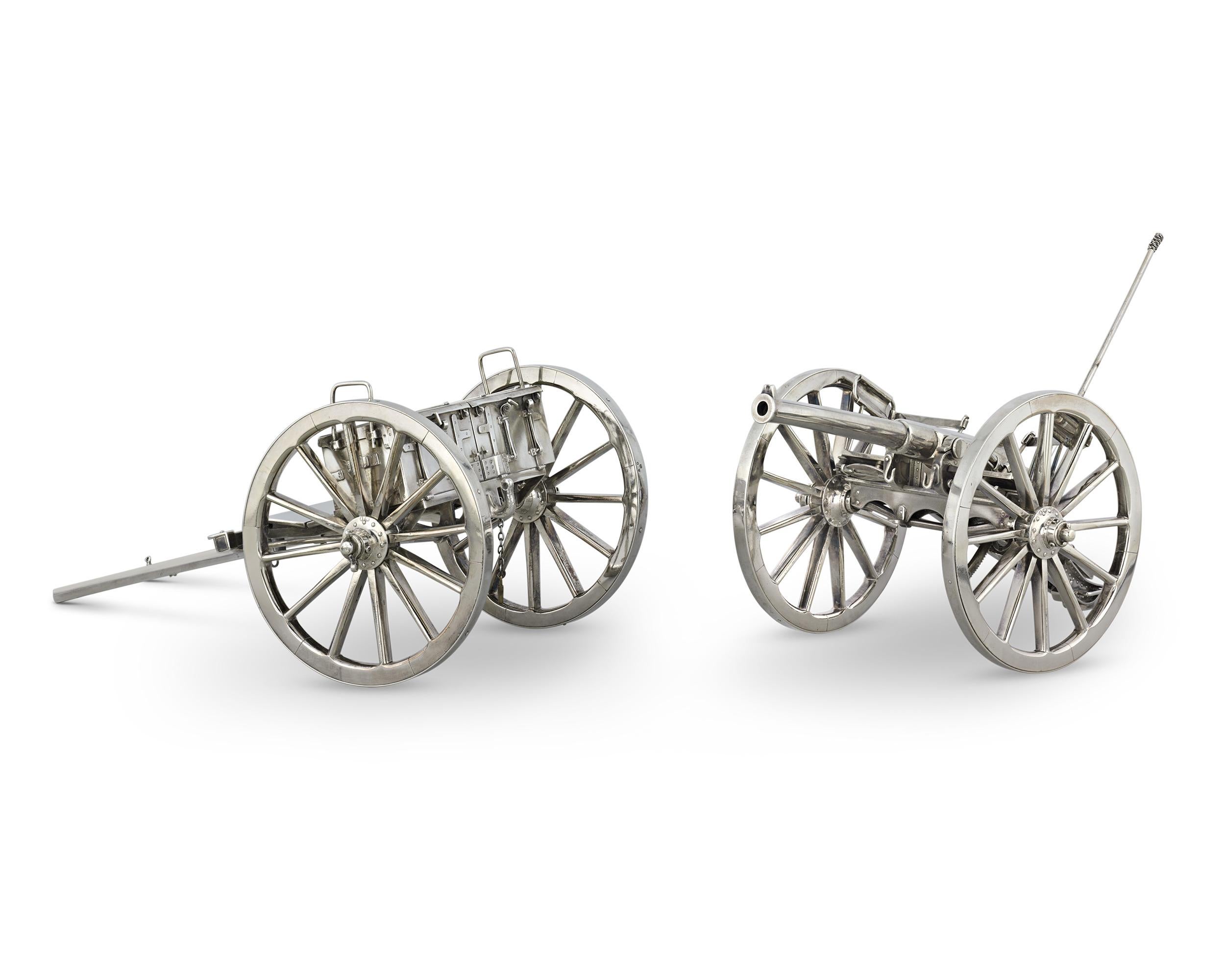Ideal for both cigar aficionados and military enthusiasts, this Late Victorian silver cannon and carriage table lighter showcases four fully functional wheels, allowing it to be effortlessly rolled to guests across a table. At the turn of the