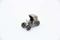 Silver car miniature