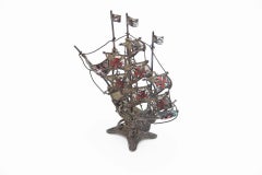 Silver caravel with filigree mesh