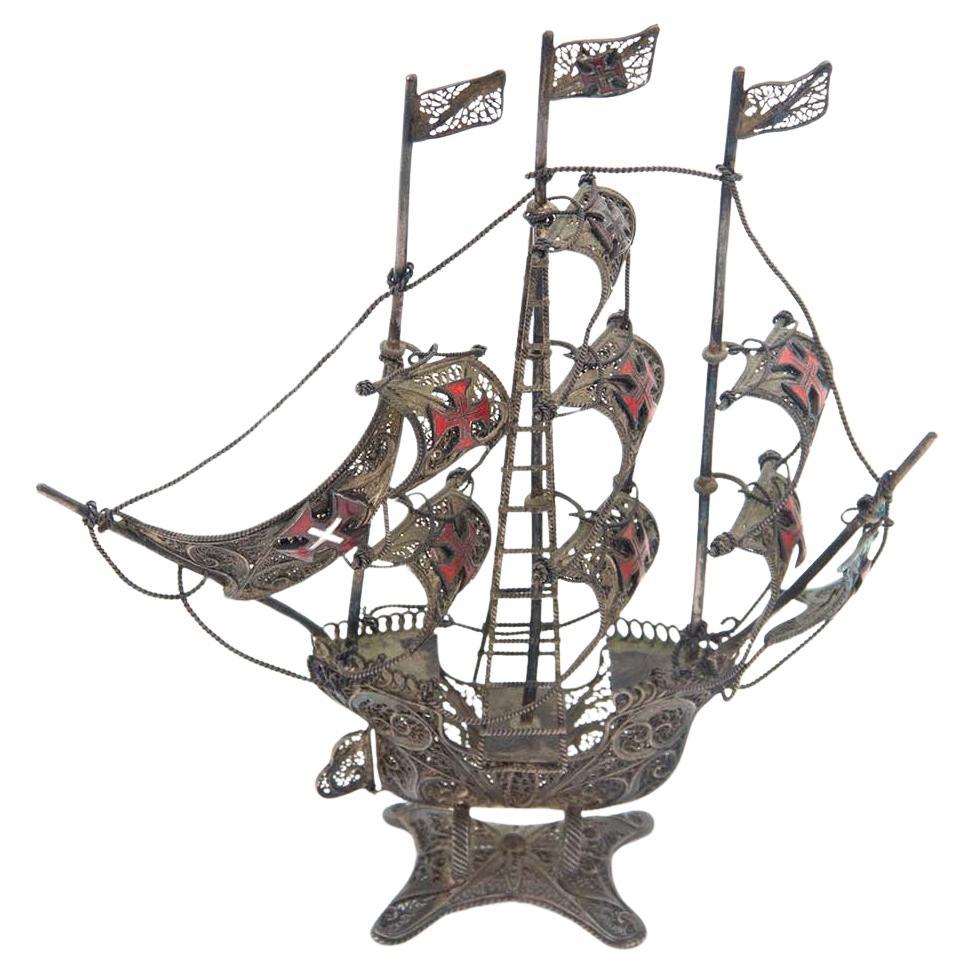 Silver caravel with filigree mesh