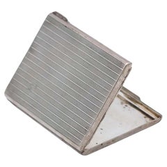 Silver cardboard box with bands on top