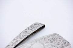 Silver cardboard box with engraved wreaths