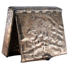 Silver case with dark blue lid appliqué and embossed box