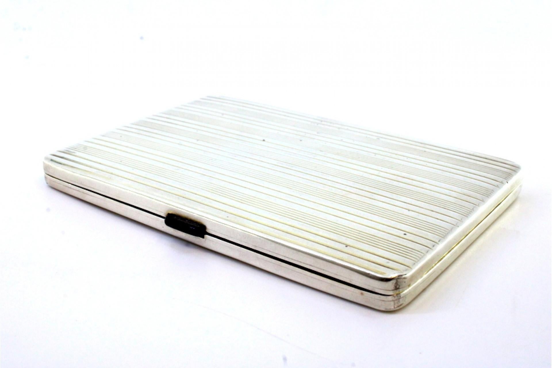 European Silver case with fluted top trim, gold interior and spring cigarette holder For Sale
