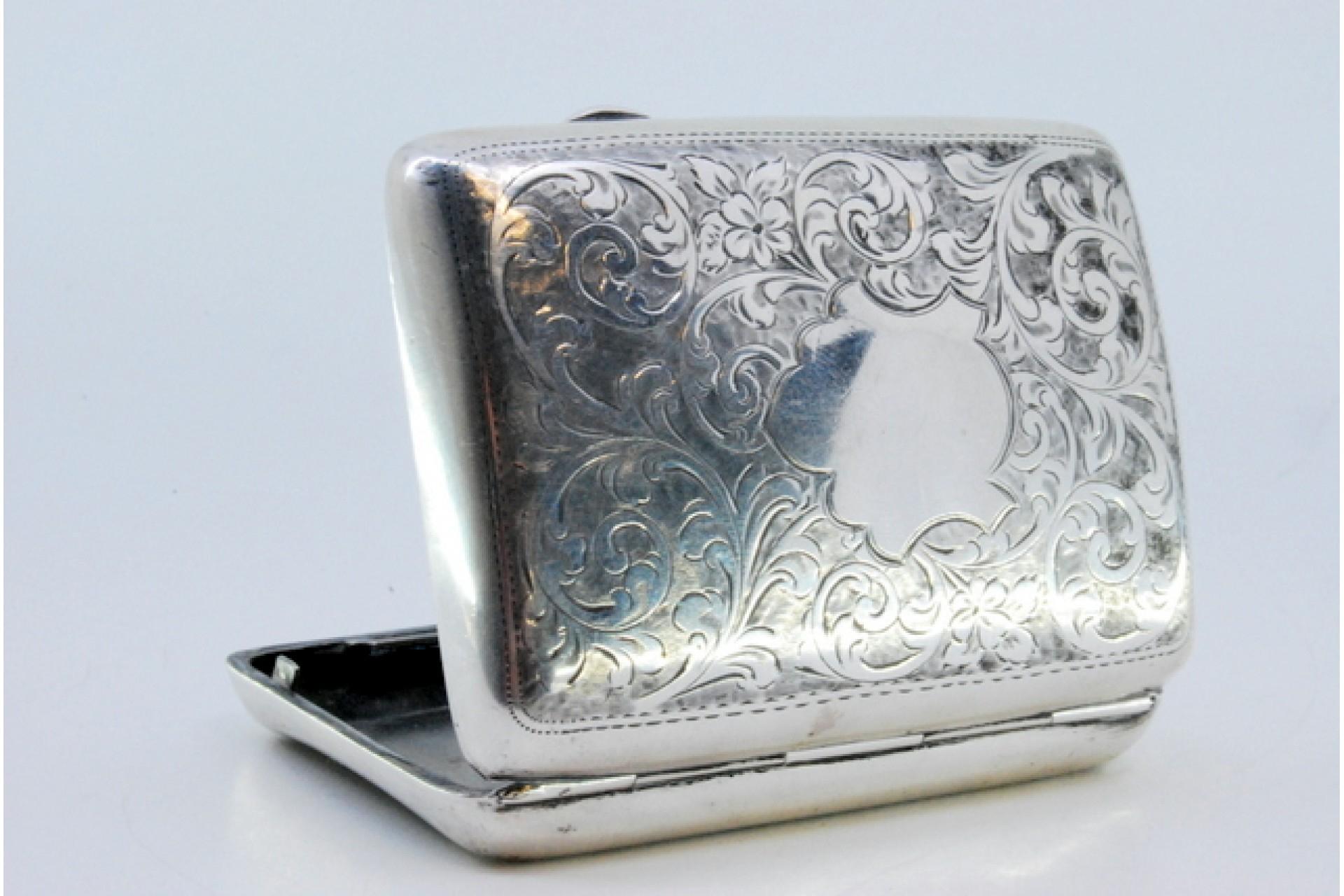 20th Century Silver case with garlands around curved monogram and silver interior For Sale
