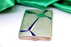 Cassa in argento con rilievi guilloché, accenti smaltati e interno dorato