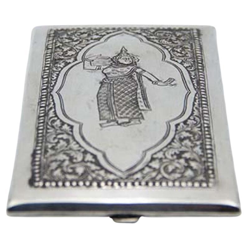 Silver case with Hindu Goddess relief, beaded frame and garlands For Sale