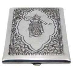 Silver case with Hindu Goddess relief, beaded frame and garlands Silver case with Hindu Goddess relief, beaded frame and garlands