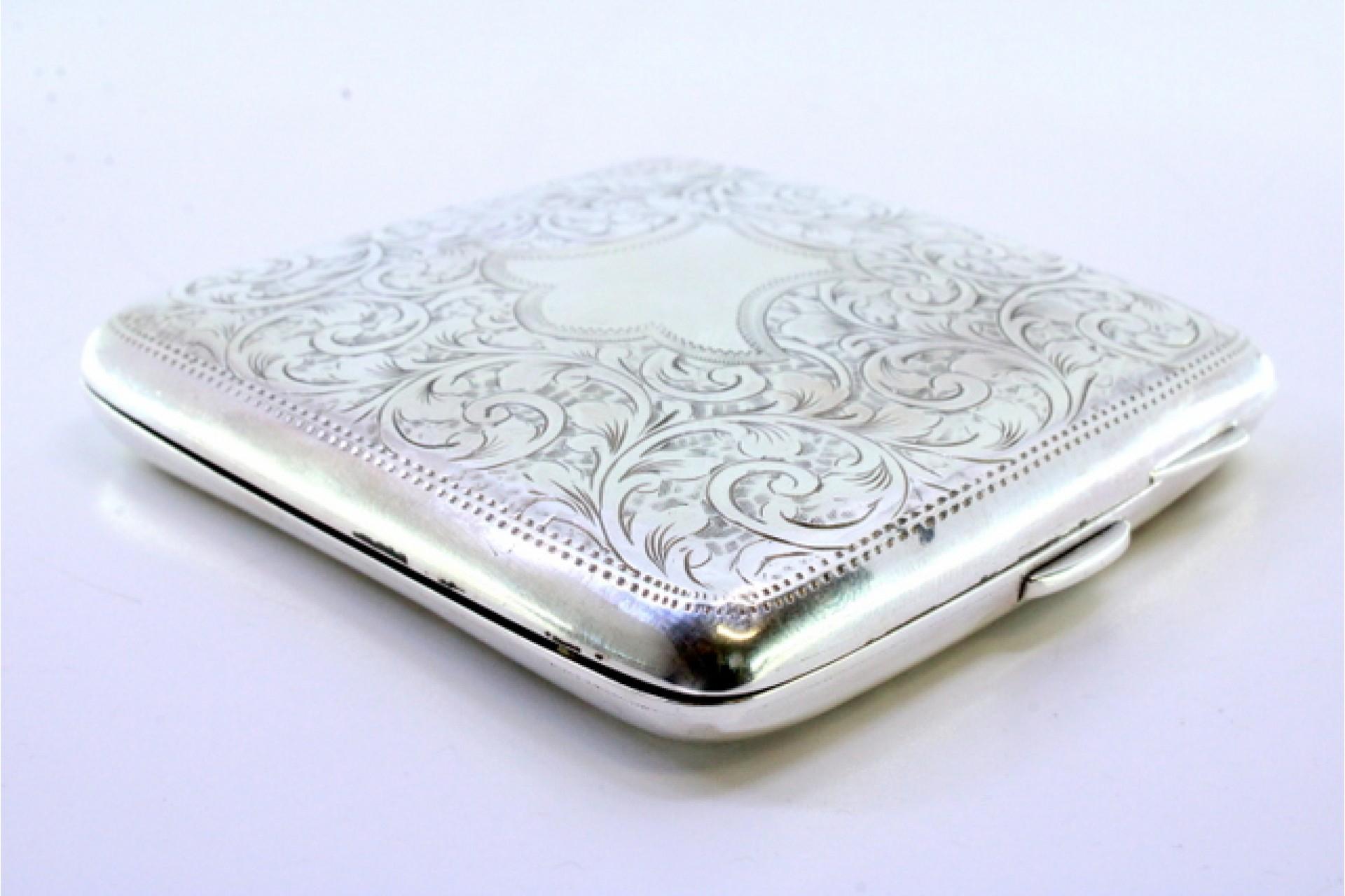 European Silver case with plant engravings around curved monogram card For Sale