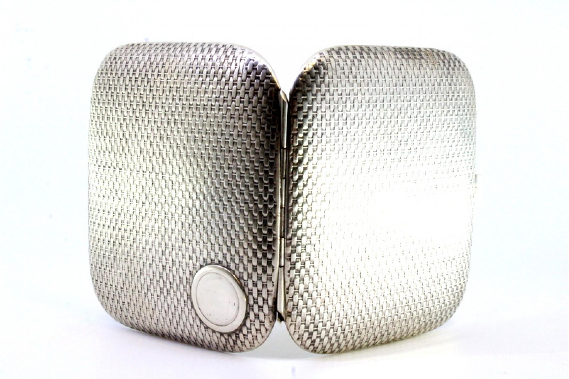 European Silver case with recessed reliefs around monogram and gold interior For Sale