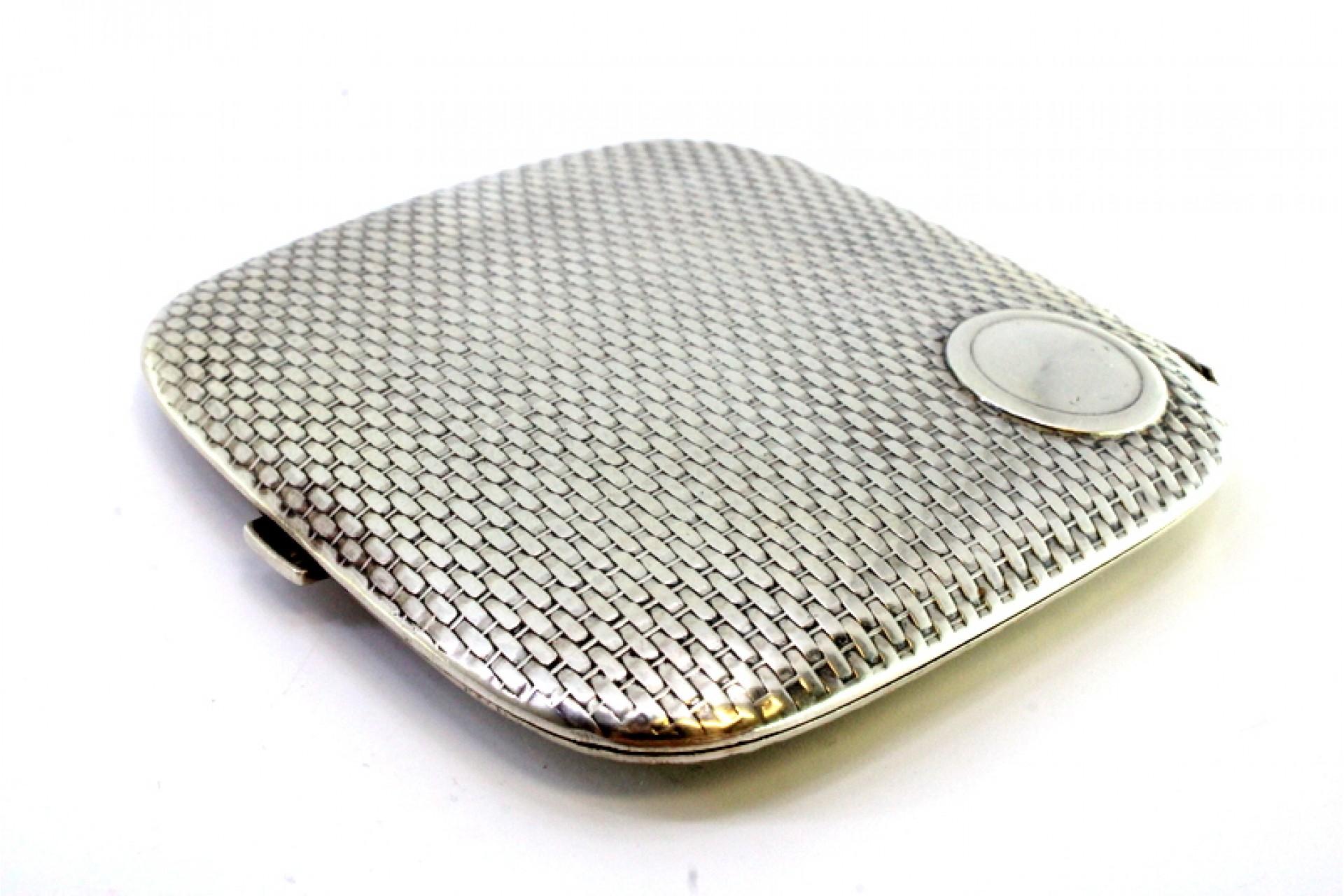 Silver case with recessed reliefs around monogram and gold interior For Sale 1