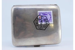 Silver case with smooth lid and enamel Mozambique seal