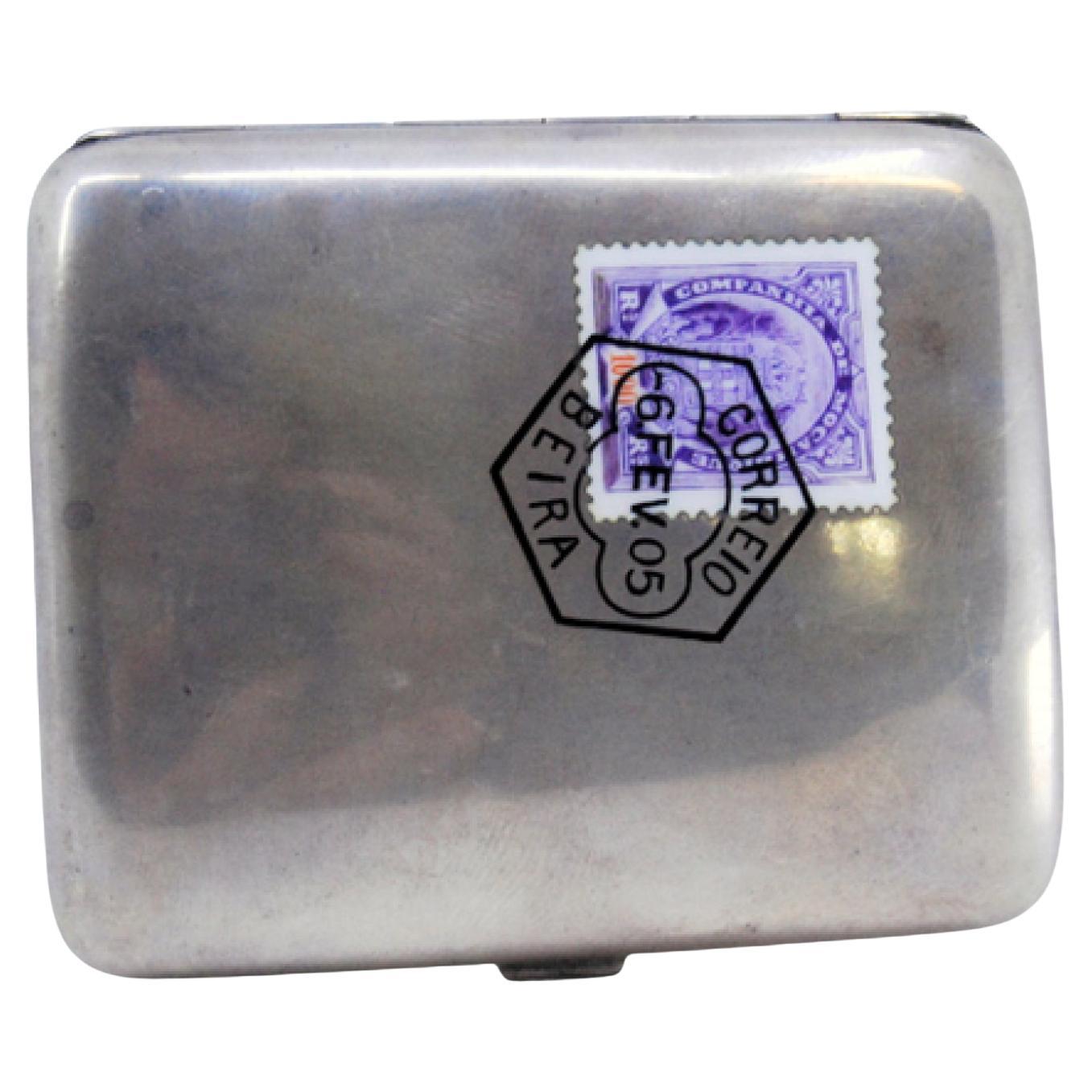 Silver case with smooth lid and enamel Mozambique seal For Sale