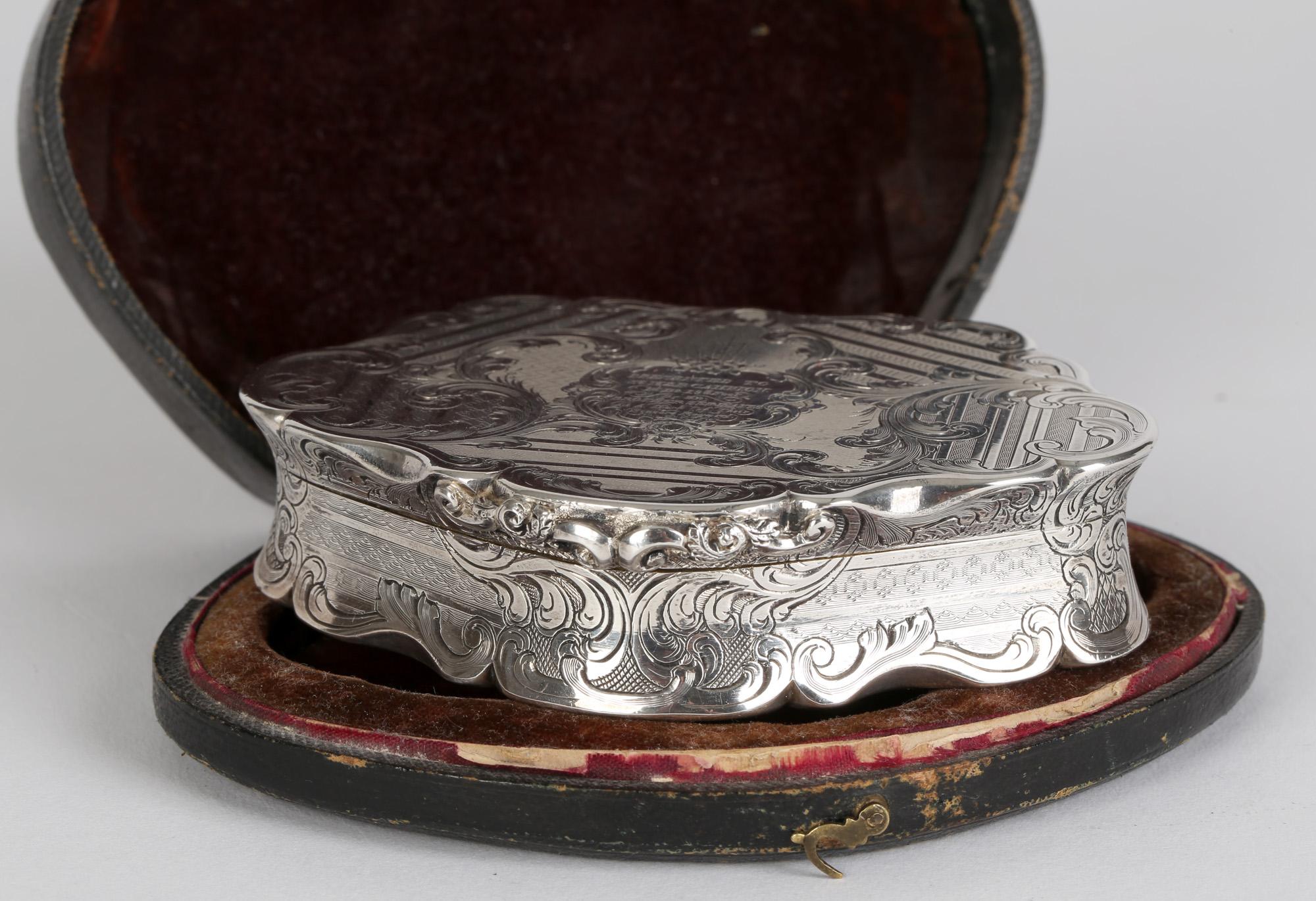 An exceptional and rare antique silver snuffbox reading 'PRESENTED TO St. Mr. P CAMPION, 1st Bn 19th Foot, by His, BROTHER SERJEANTS, As A Mark of Their, Sincere Regard.' in its original shaped fitted case and made by Cronin & Wheeler, Birmingham in