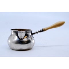 Silver casserole with bone handle