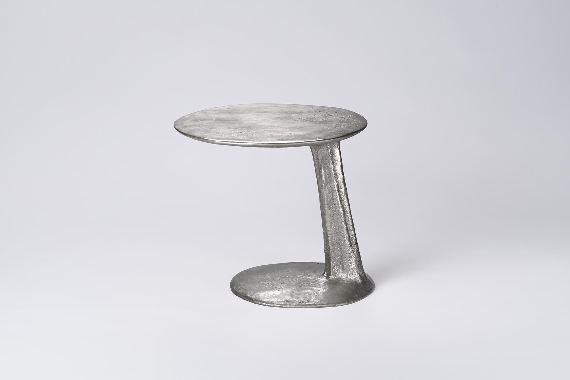 Silver Cast Brass Lava Large Side Table by Atelier V&F
Dimensions: D 52 x W 50 x H 46 cm. 
Materials: Cast brass with a silver finish.

Available in different finishes (cast, black and silver). Available in two different sizes. Prices may vary.