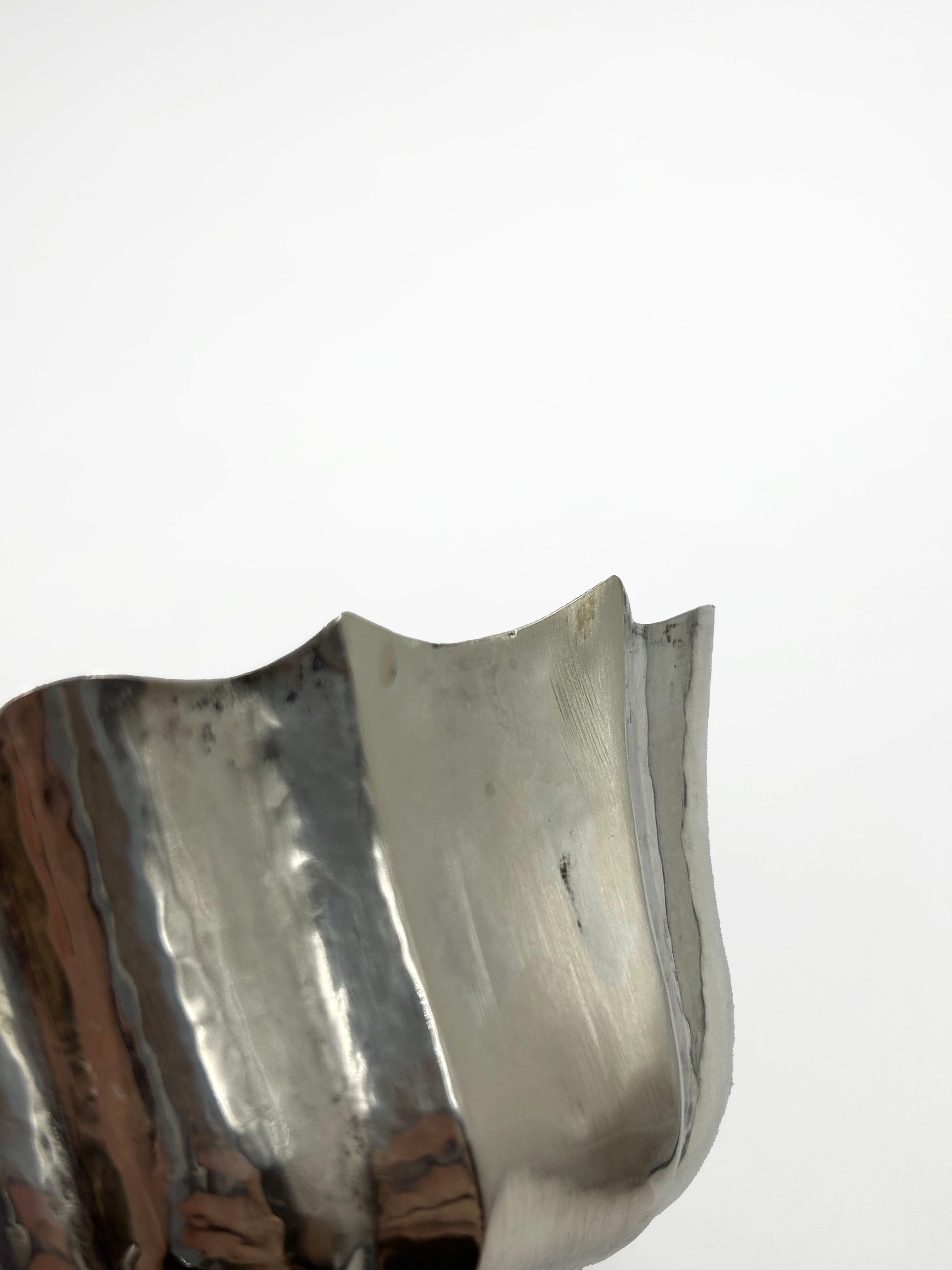 Silver Centerpiece by Josef Hoffmann for the Vienna Secession
Elegant silver (precious metal) centerpiece designed by Josef Hoffmann and executed by the Vienna Secession. The design is characterized by its bowl-shaped pedestal, with a lobed outer