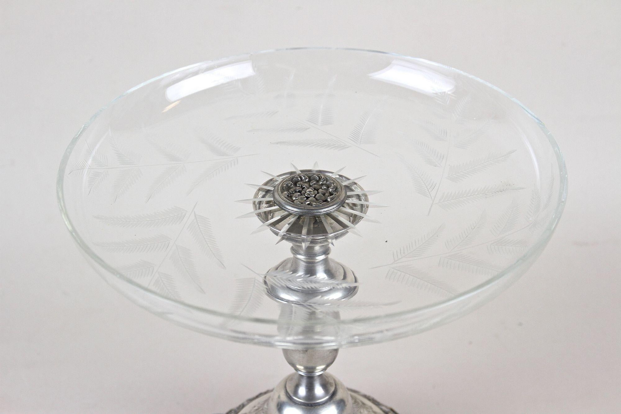 Fantastic Art Nouveau silver centerpiece with glass bowl from the period in Austria around 1895. The artfully shaped base, elaborately made of 276,3 gramm solid silver, shows an outstanding design with impressive floral/ organic elements. The wide