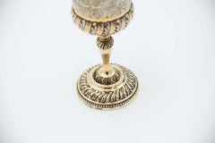 Silver chalice with circular base and reliefs